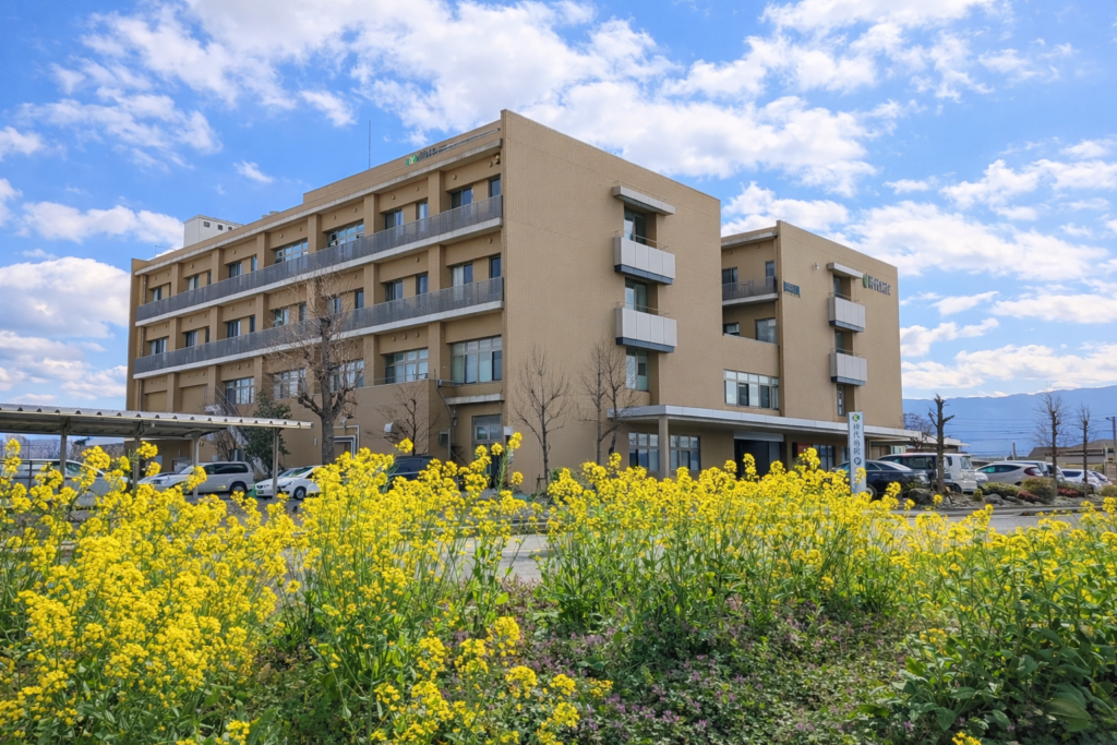 神代病院と菜の花